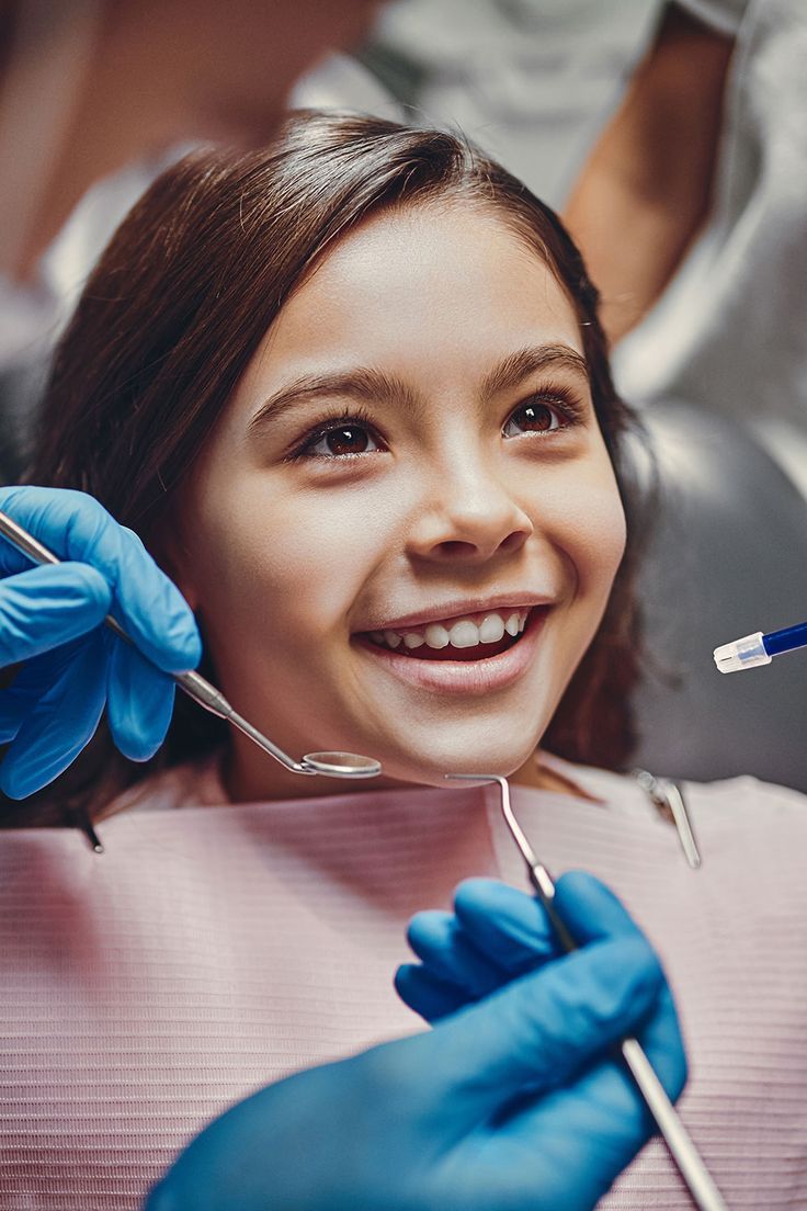 Young dental crown patient receiving care