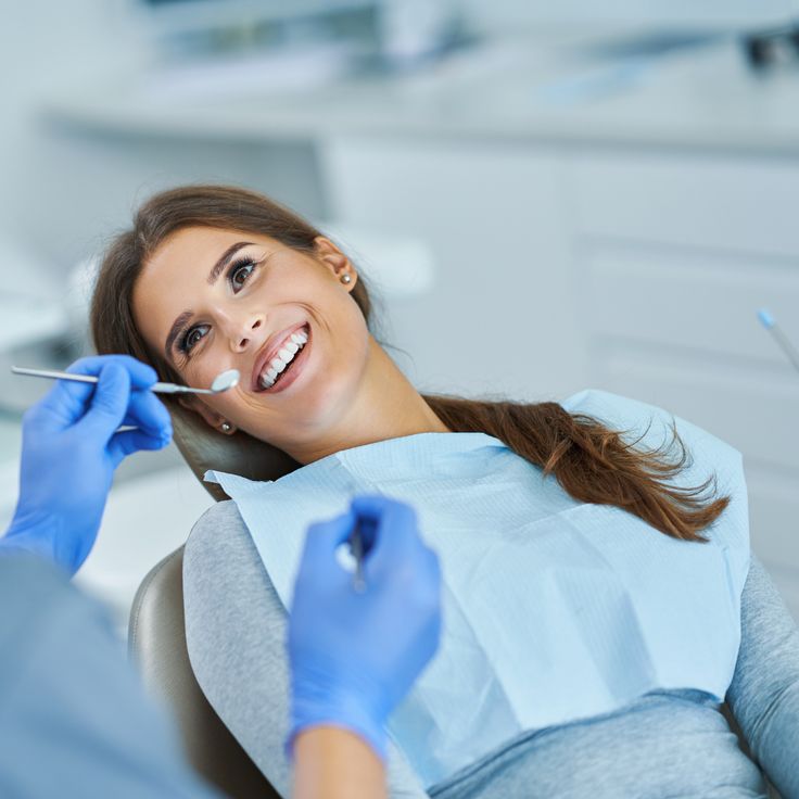 Smiling dental filling patient
